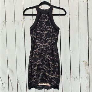 Black Lace Cocktail Dress with Nude Underlay